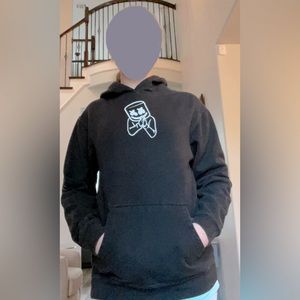Black hoodie with the singer Marshmello on the front and back